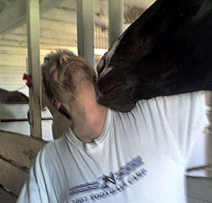 Ken takes one for the club while campaigning for the presidency.  Camp Courage horse Elvis gives him a smooch! 