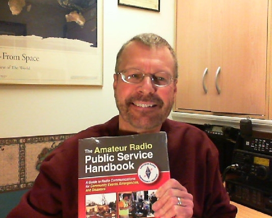 WA0TDA with new ARRL Amateur Radio Public Service Manual.