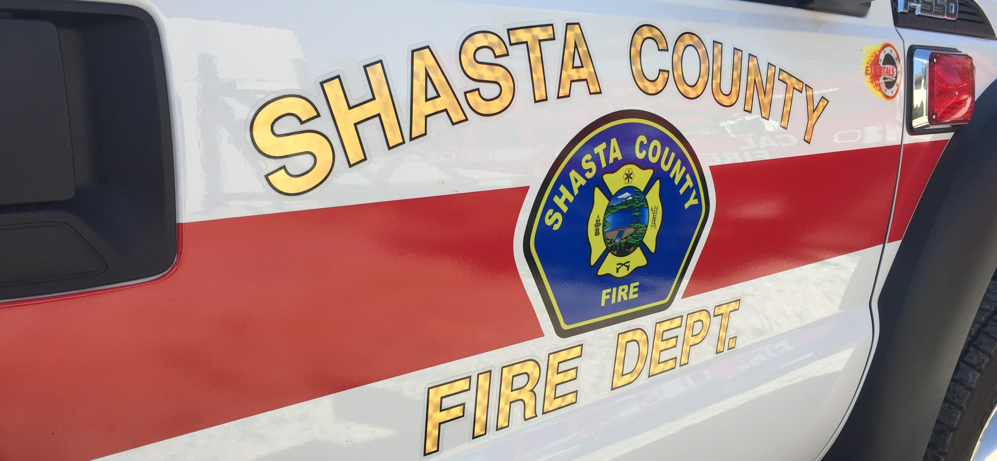 Photo of Shasta County Fire Department logo on side of truck.