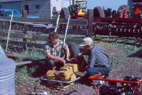 Pat and Newt check out a generator, circa 1971.